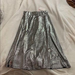 Mid length silver party skirt